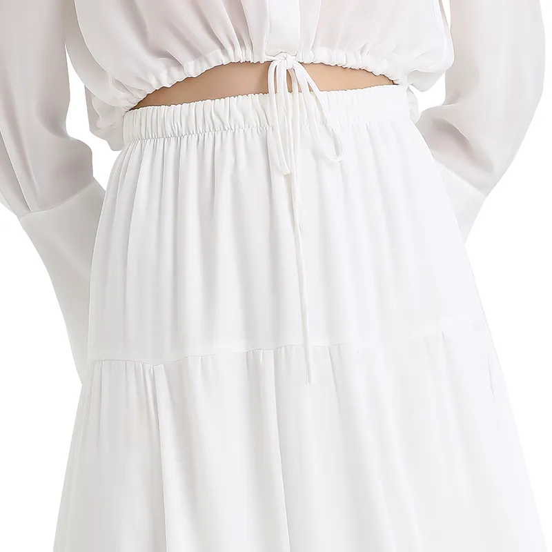 S068-10 Women solid asymmetric panelled long flare handkerchief skirt