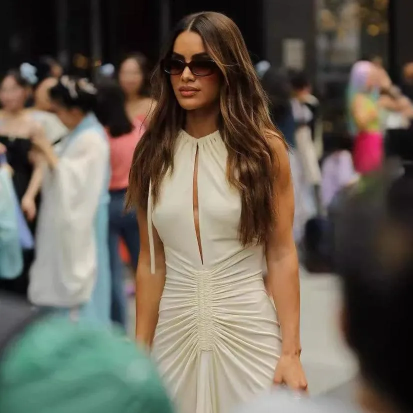 Sleeveless round neck tie pleated swing dress